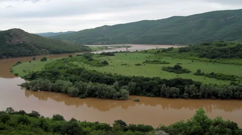 Muddy risen mountain river Stock Footage 21992827