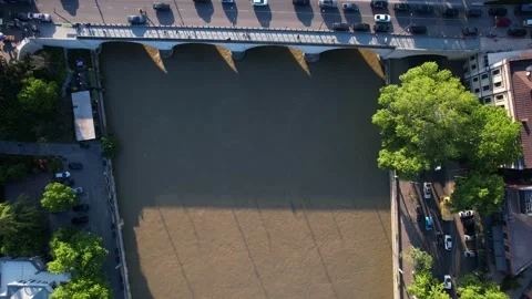 Muddy river and traffic on the bridge Stock Footage 194438339