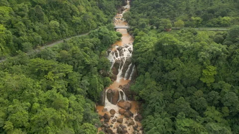 Muddy River Flows Through Green Jungle Sukabumi Java Indonesia Drone Track In Video stock 333677444