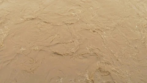 Muddy river water flowing Stock Footage 118879164