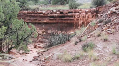 Muddy River Waterfall From Far Stock Footage 11874959