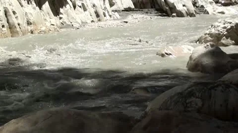 Muddy stream at gorge Stock Footage 10770047