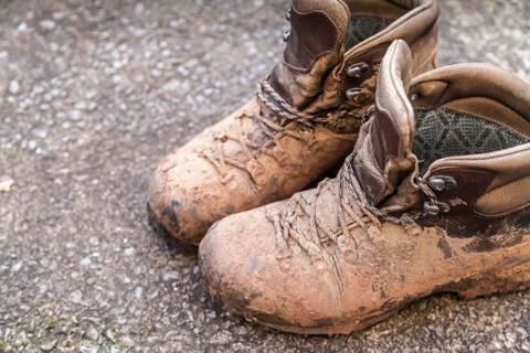 Muddy walking boots Stock Photos
