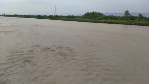 Muddy Water flowing in the river. Stock Footage 272200057