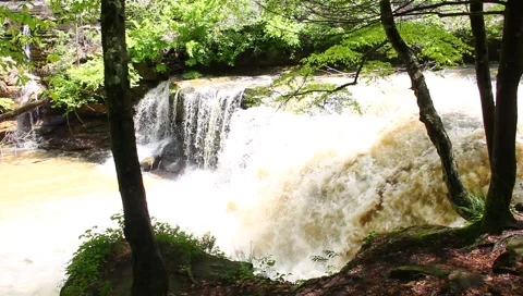 Muddy waterfall Stock Footage 4965891