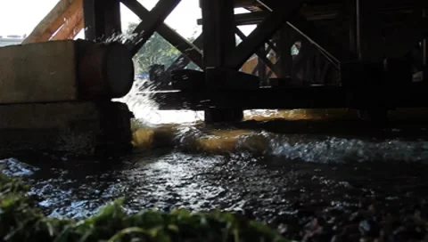 Muddy waves of the river beat against the shore Stock Footage 7747890