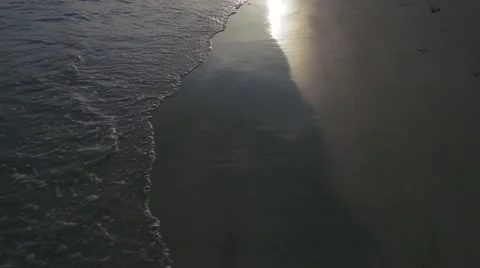 Mudflats on the beach at sunset. Slow motion Stock Footage 58791873