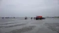 Mudflats horse racing leading car driving in low tide watt 4k or 4k+ Resolution