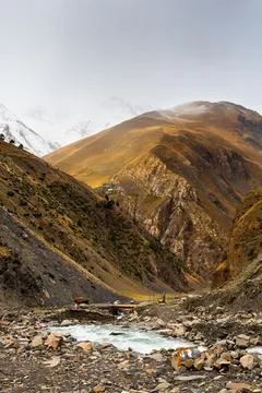 Mudflow-destroyed road in the mountain Stock Photos