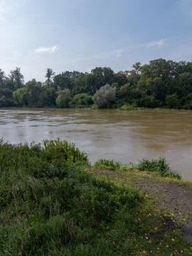 Mudflow of water in the Oder River of brown color. Poland. View from above... Stock Photos