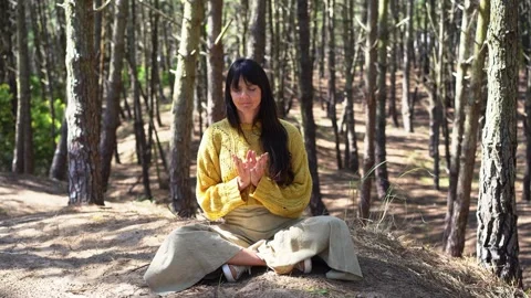 Mudras executed by a woman in the forest Video stock 252773163