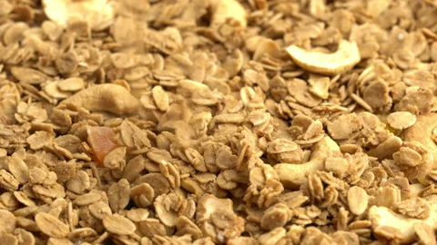 Muesli cereal falling on the pile. Stock Footage 223874555