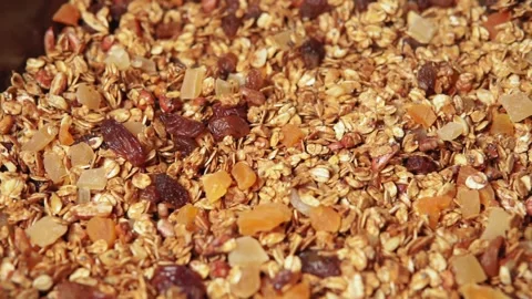 Muesli heap, abstract grain pattern, granule texture as background, baked muesli Stock Footage 132389105