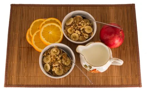 Muesli with walnuts and bananas Stock Photos