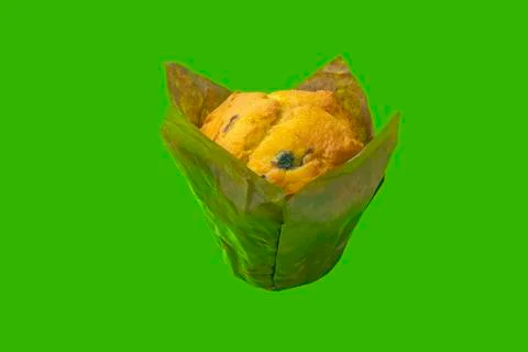 Muffin on a green background close-up. isolate Stock-Fotos