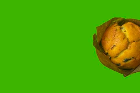 Muffin on a green background close-up. isolate Stock-Fotos