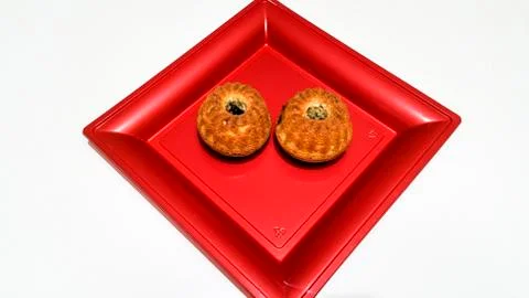 Muffin on red tray Photos