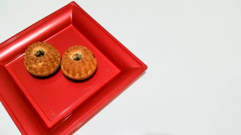 Muffin on red tray Stock Photos