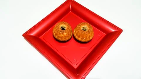 Muffin on red tray Stock Photos
