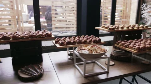 Muffins and pastry on a buffet table on the party Stock Footage 171885599