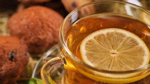 Muffins and tea with lemon Stock Footage 104025594