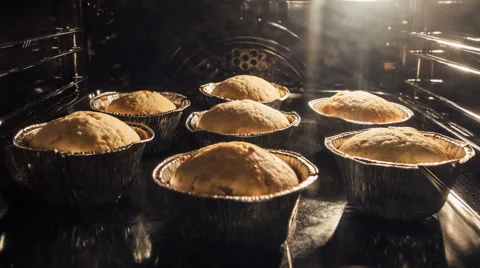 Muffins. Baking In Oven. Time Lapse Video stock 55648448