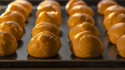 Muffins. Baking in oven. Time lapse footage of cooking Cupcakes, 4k, UHD. Stock Footage 272449388
