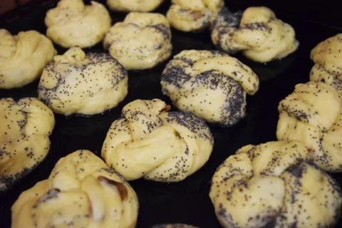 Muffins in a baking pan Stock Photos