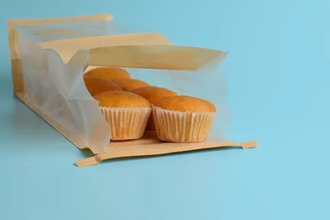Muffins on a blue background Stock Photos