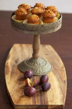 Muffins on cake stand Stock Photos