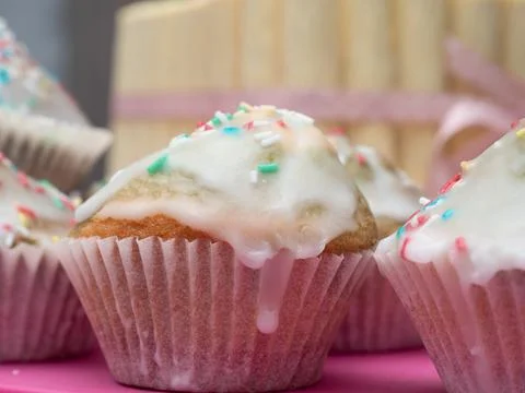 Muffins with icing. Stock Photos