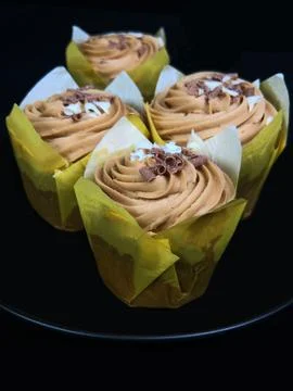 Muffins isolating on black background Stock Photos