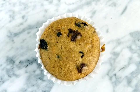 Muffins on a plate on a marble table Stock Photos