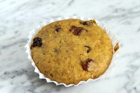 Muffins on a plate on a marble table Stock Photos