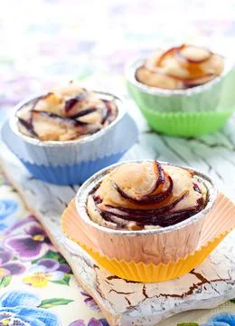 Muffins with plums Stock Photos