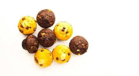Muffins on white reflective surface Stock Photos