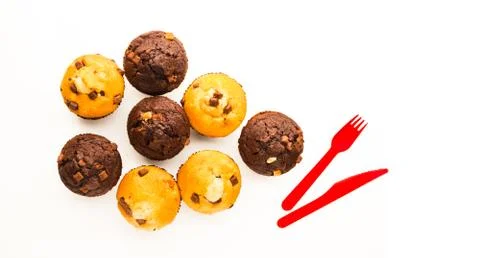 Muffins on white reflective surface Stock Photos