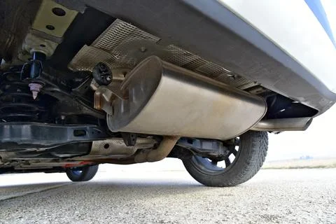 Muffler on the lower part of the car Stock Photos