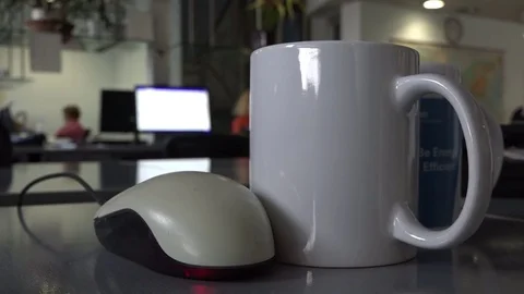 Mug and computer mouse Stock Footage 70498518