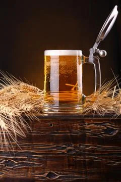 Mug of beer on a chest Stock Photos