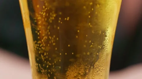 Mug with beer close up macro street tourist. Beer bubbles Stock Footage 153203184