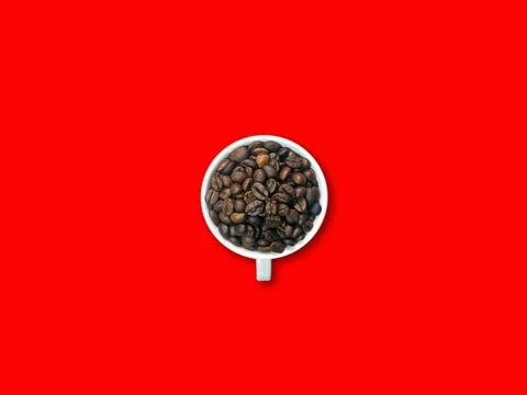 A mug with coffee beans. 스톡 사진