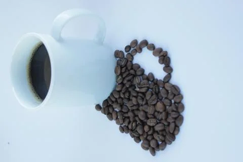 Mug of coffee. the shadow from the coffee bean Stock Illustration