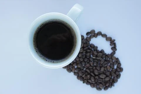 Mug of coffee. the shadow from the coffee bean イラスト素材