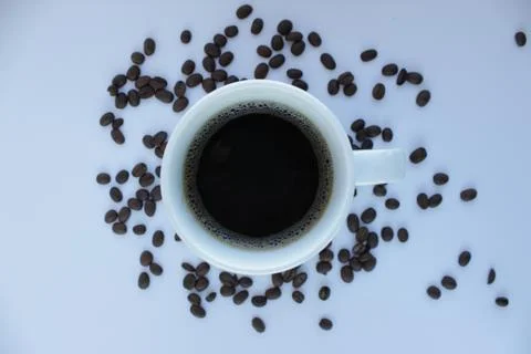 Mug of coffee. the shadow from the coffee bean Stock Illustration