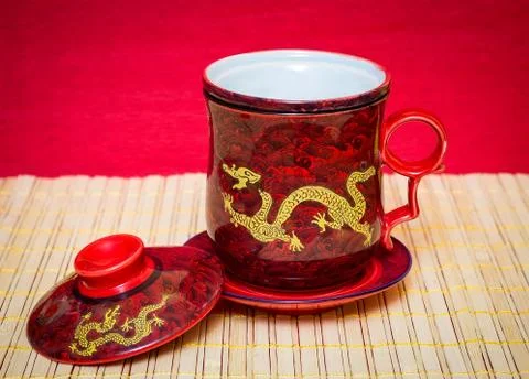 Mug with dragon Stock Photos