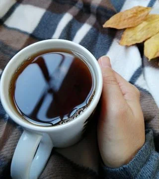Mug in hand. Foto stock