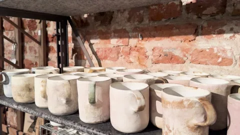 Mug with handle. Handmade ceramic tableware Stock Footage 257479295