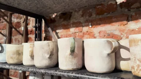 Mug with handle. Handmade ceramic tableware Stock Footage 257480306