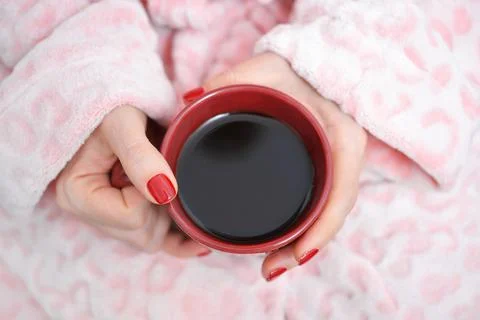 Mug in hands Foto stock